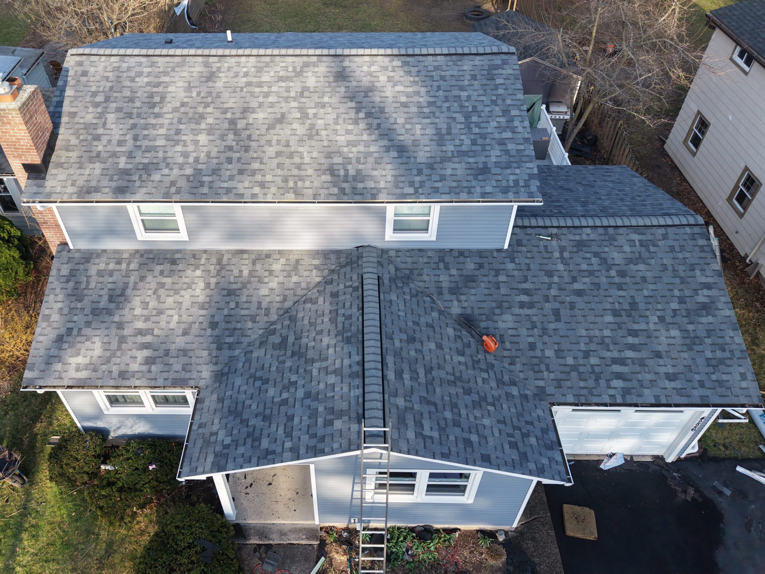 Gray shingle roof installation Rochester
