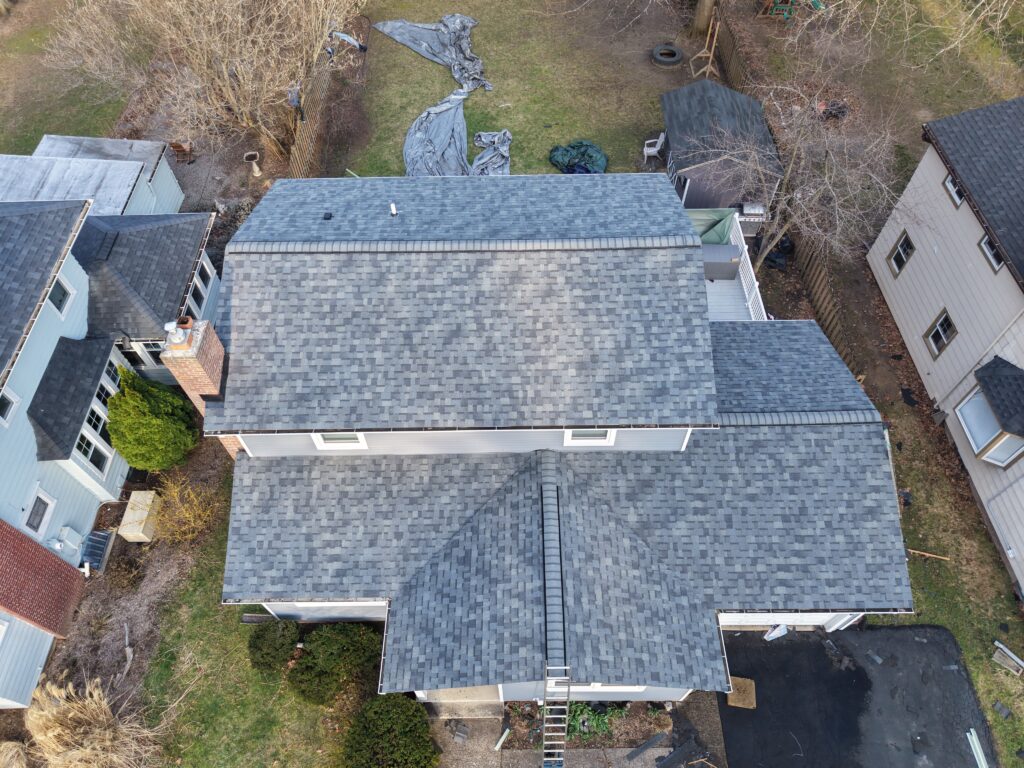 Estate Gray roof with light siding